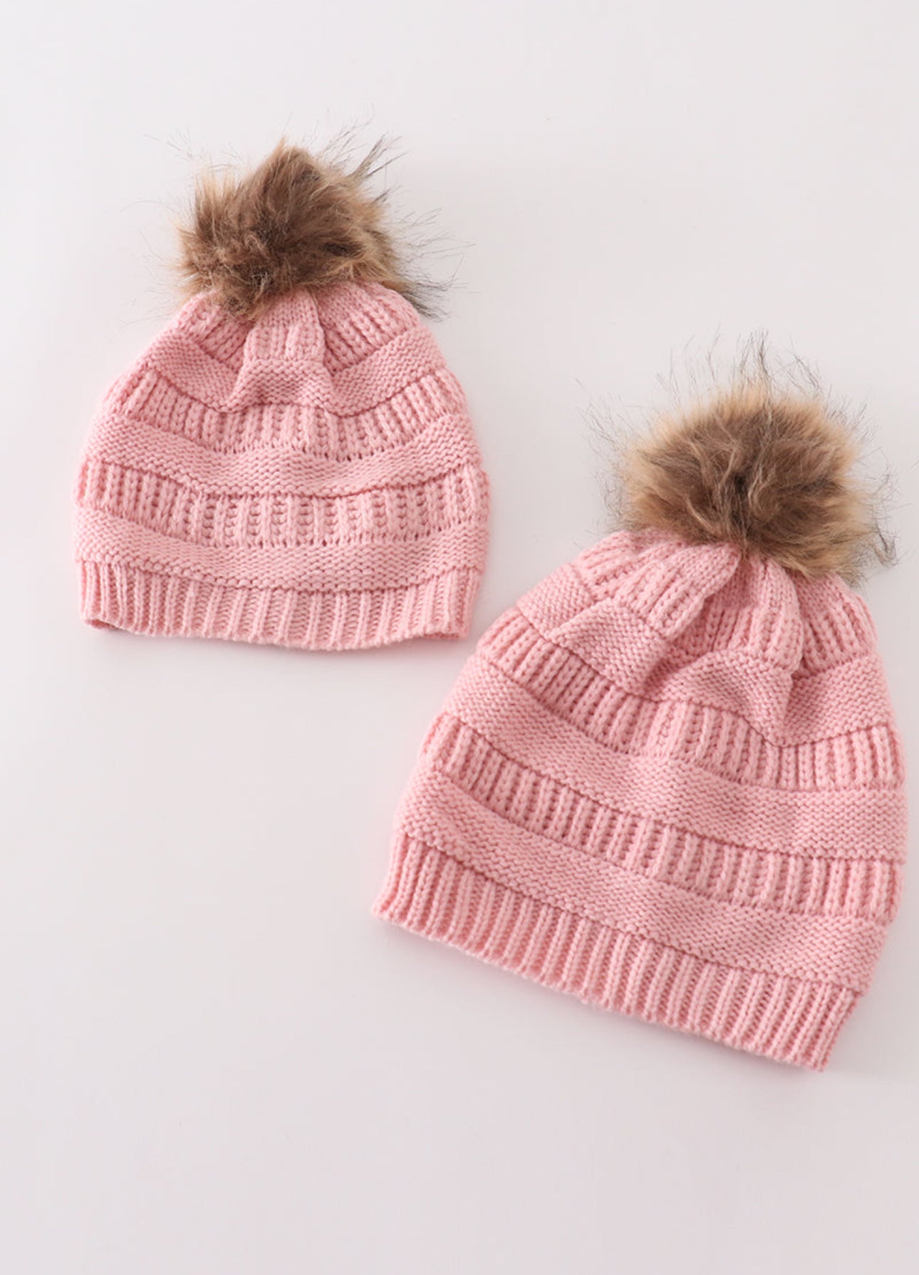 Pink pompom cable beanie