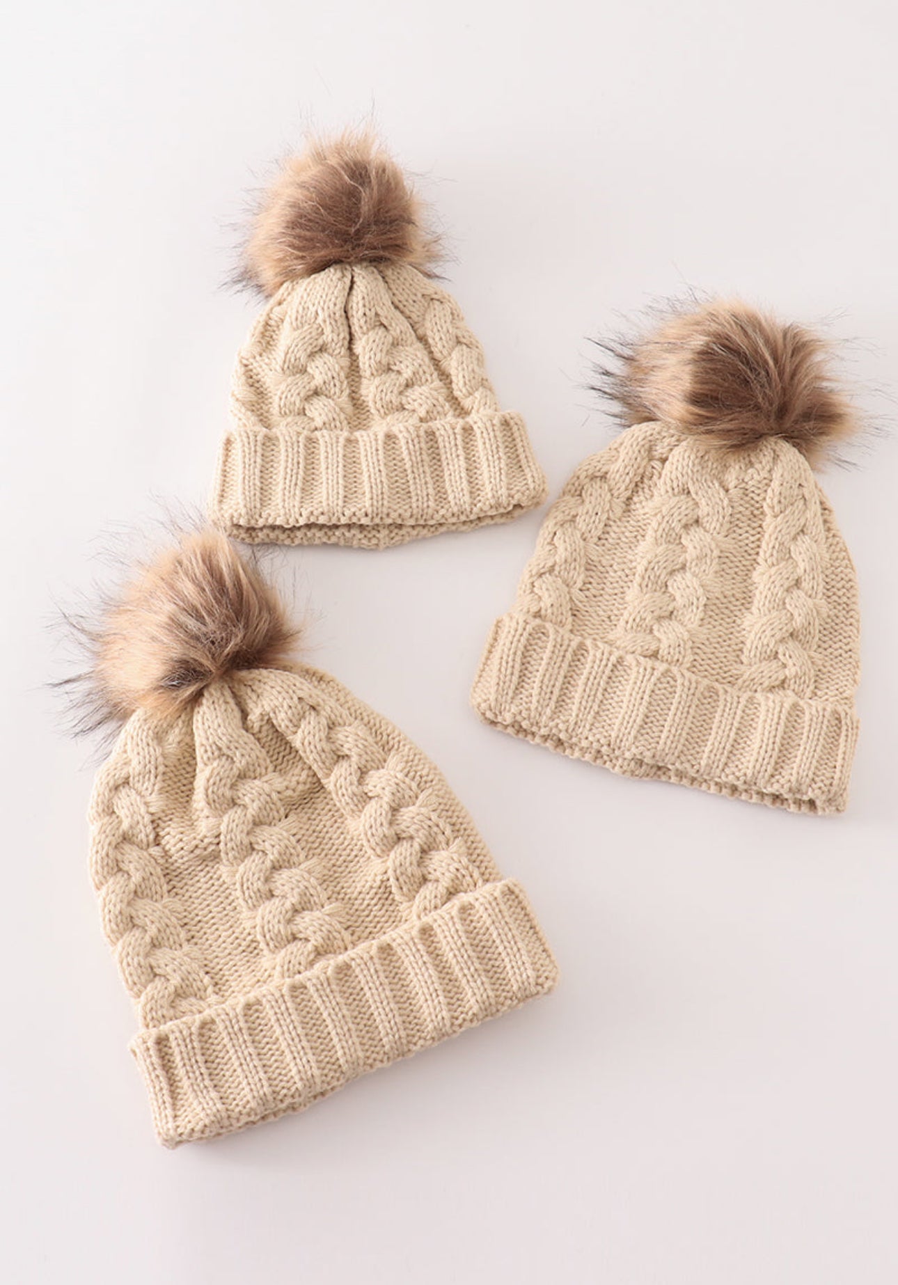 Beige pompom cable beanie